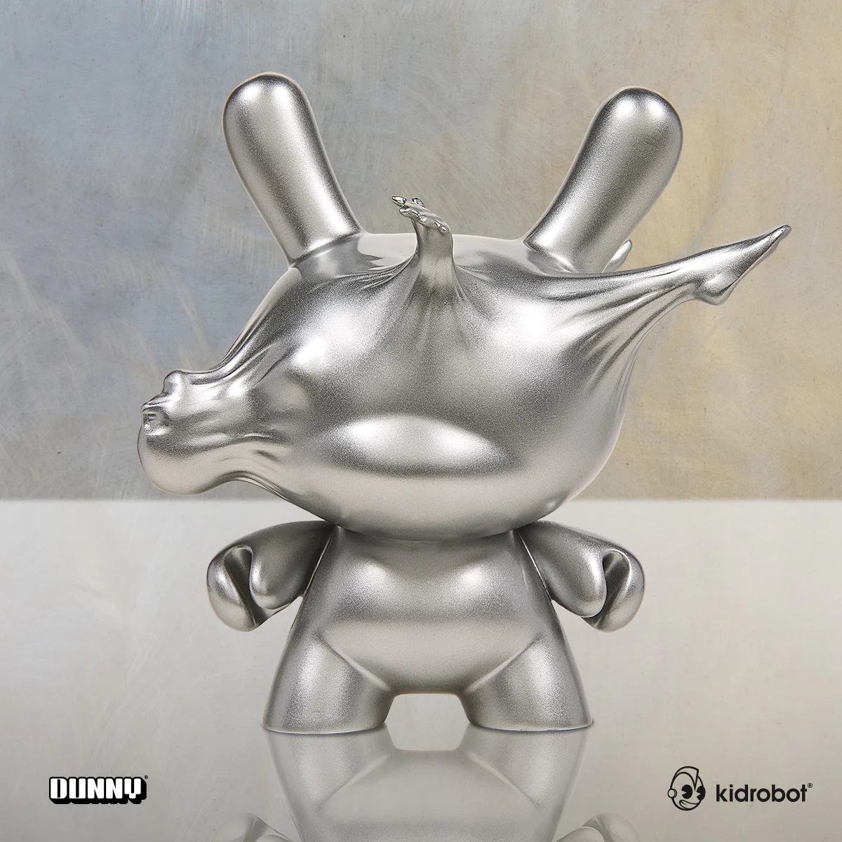 DCON 2022: Breaking Free 8" Resin Dunny by WHATSHISNAME - Metallic Silver Edition (Limited Edition) - Image 3
